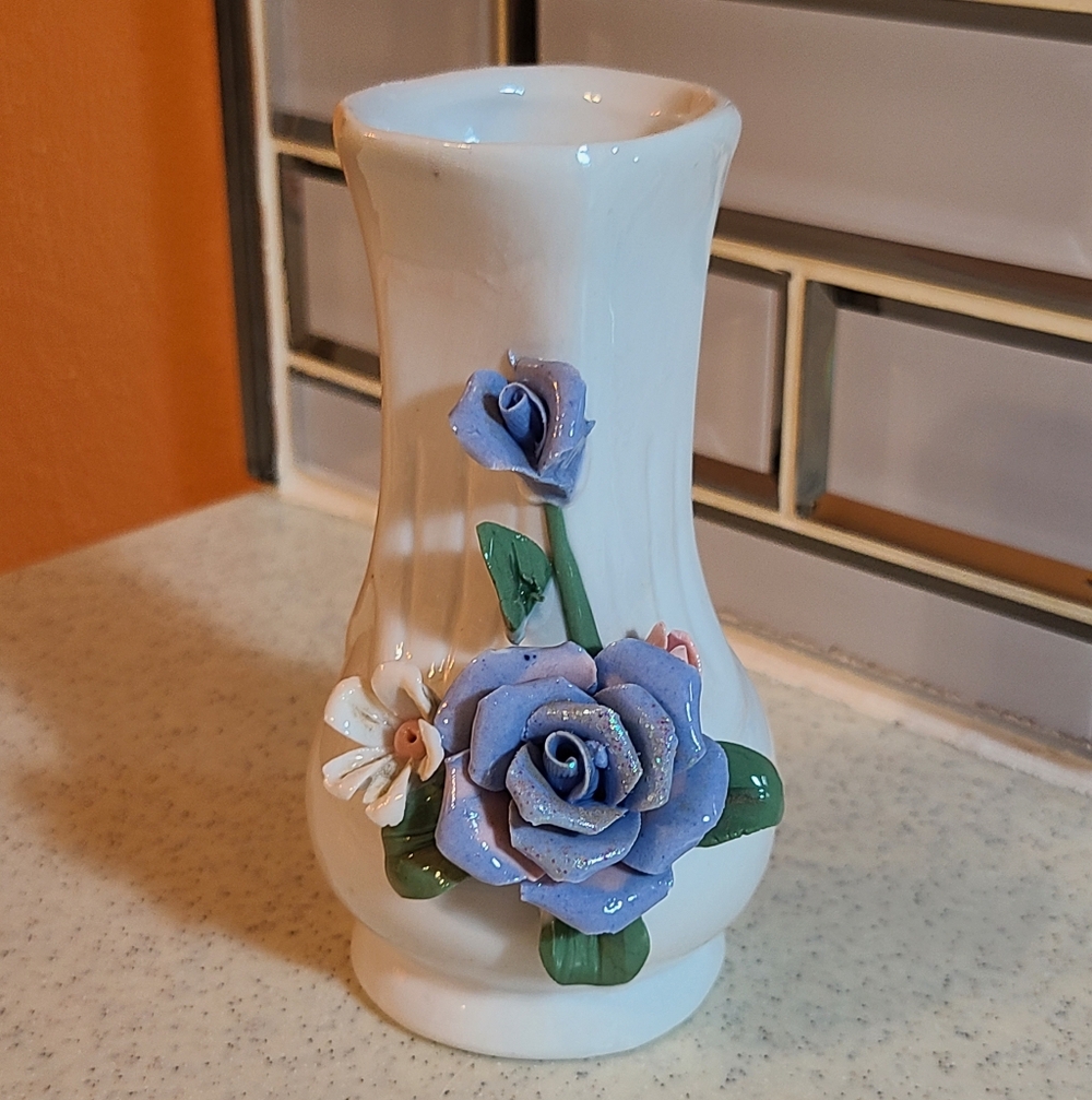 Elegant White Vase with Blue Floral Design
